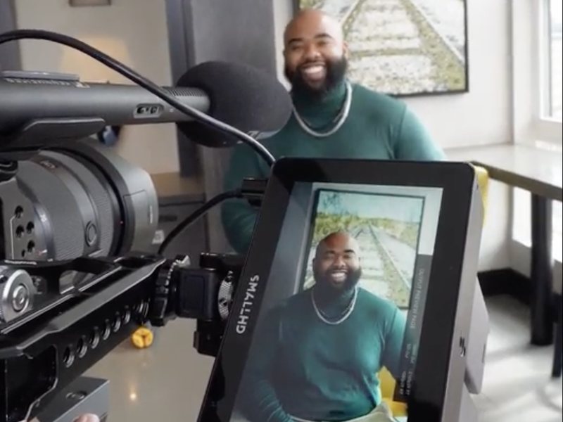 Behind the scenes at a Venture to Bloom session, a client on the camera monitor